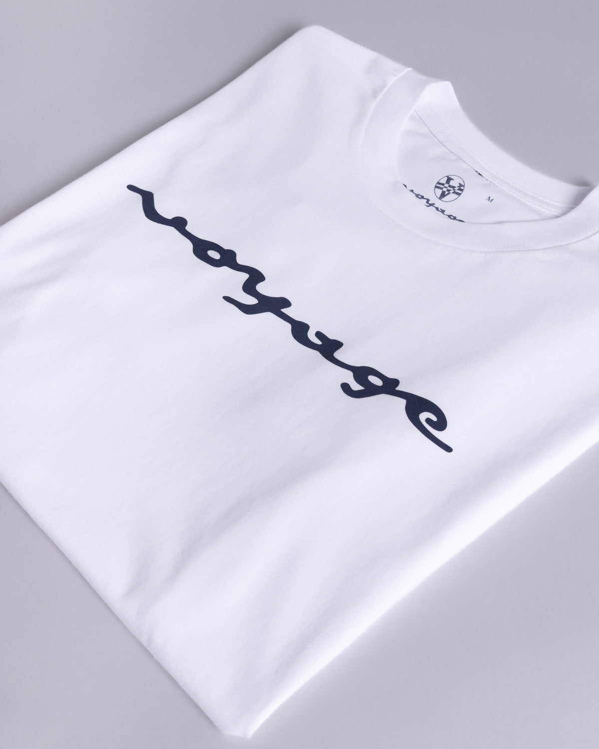 Voyage Script Tee White, close-up detail