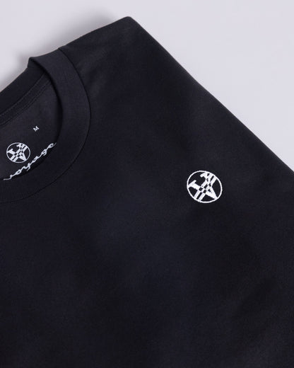 Voyage Icon Tee Black, close-up detail