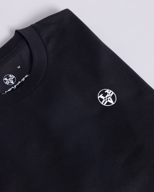 Voyage Icon Tee Black, close-up detail